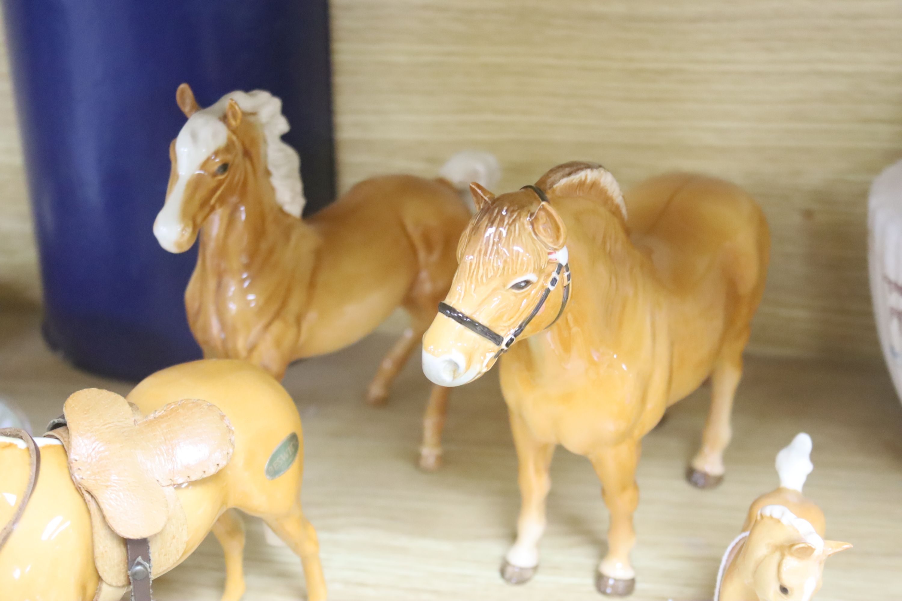 Eight Beswick Palomino horses